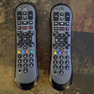 Set of 2 Xfinity Comcast XR2 remote controls.